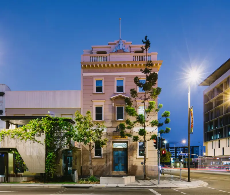 The Connolly Suthers office building on a city street