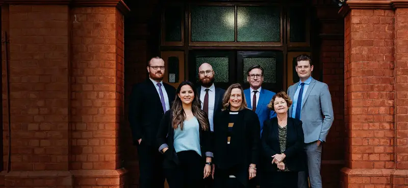 The D'Angelo Lawyers team outside their office
