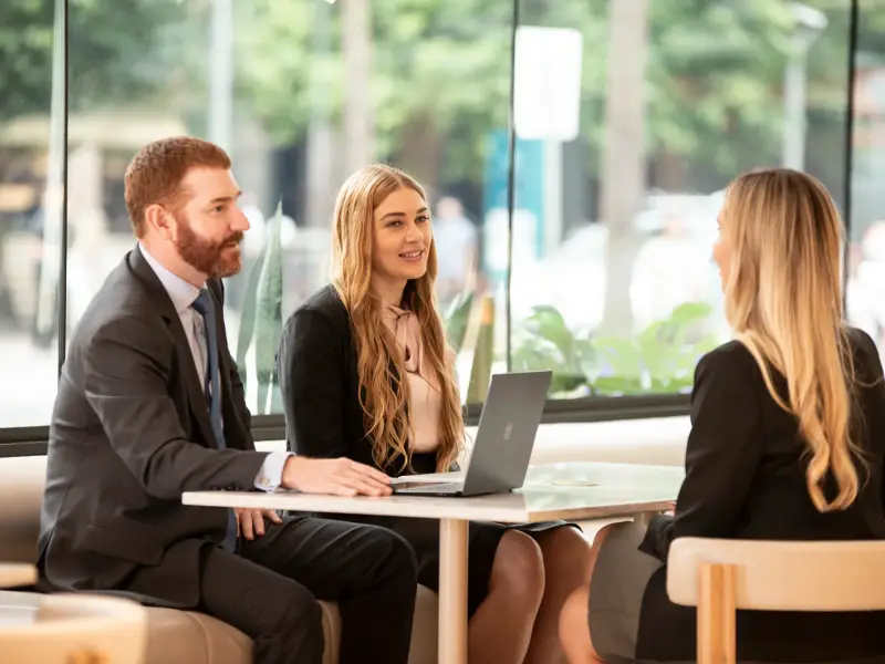 The Kingston Reid team in a meeting