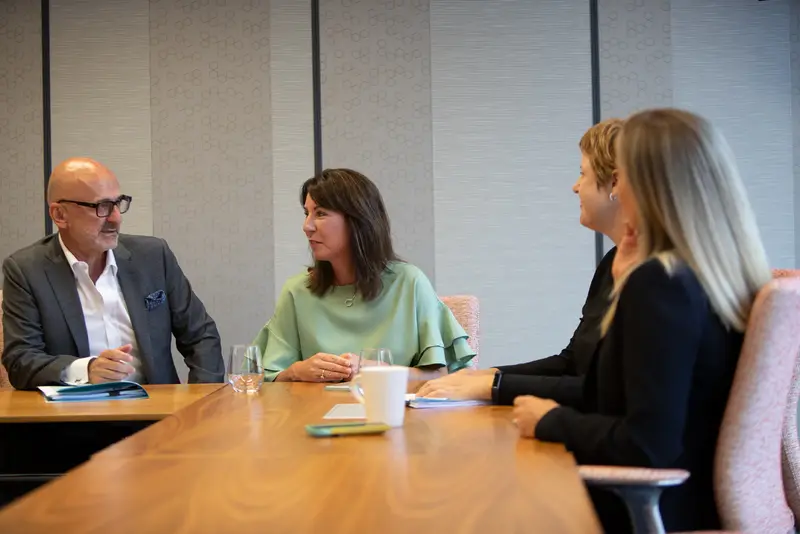 The MV Law team in a meeting